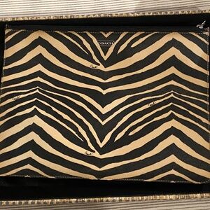 Coach , zebra print clutch bag